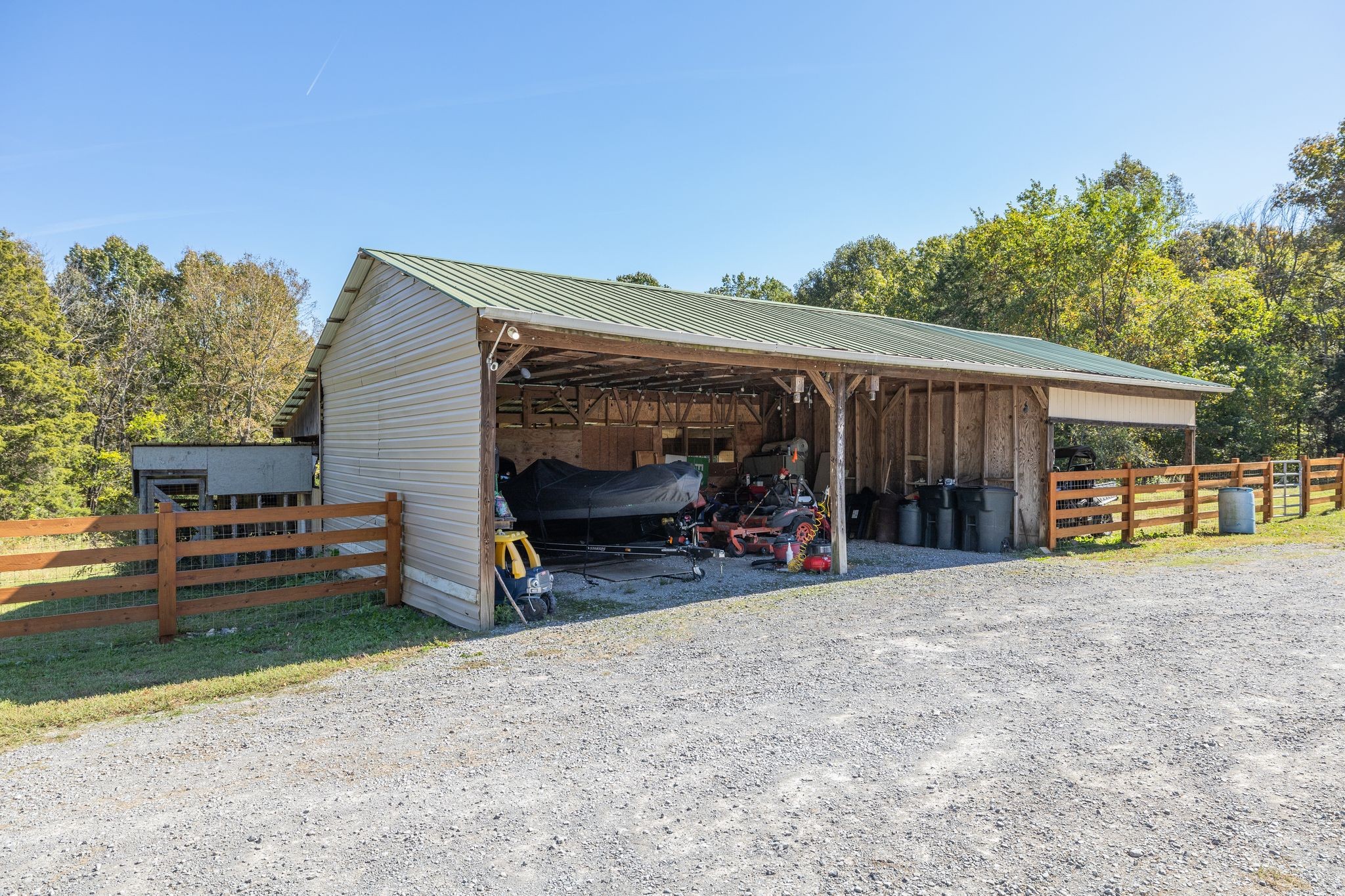 254 Borum Road Watertown, TN 37184 - Photo 39 of 51 a view of a house with a patio and a yard