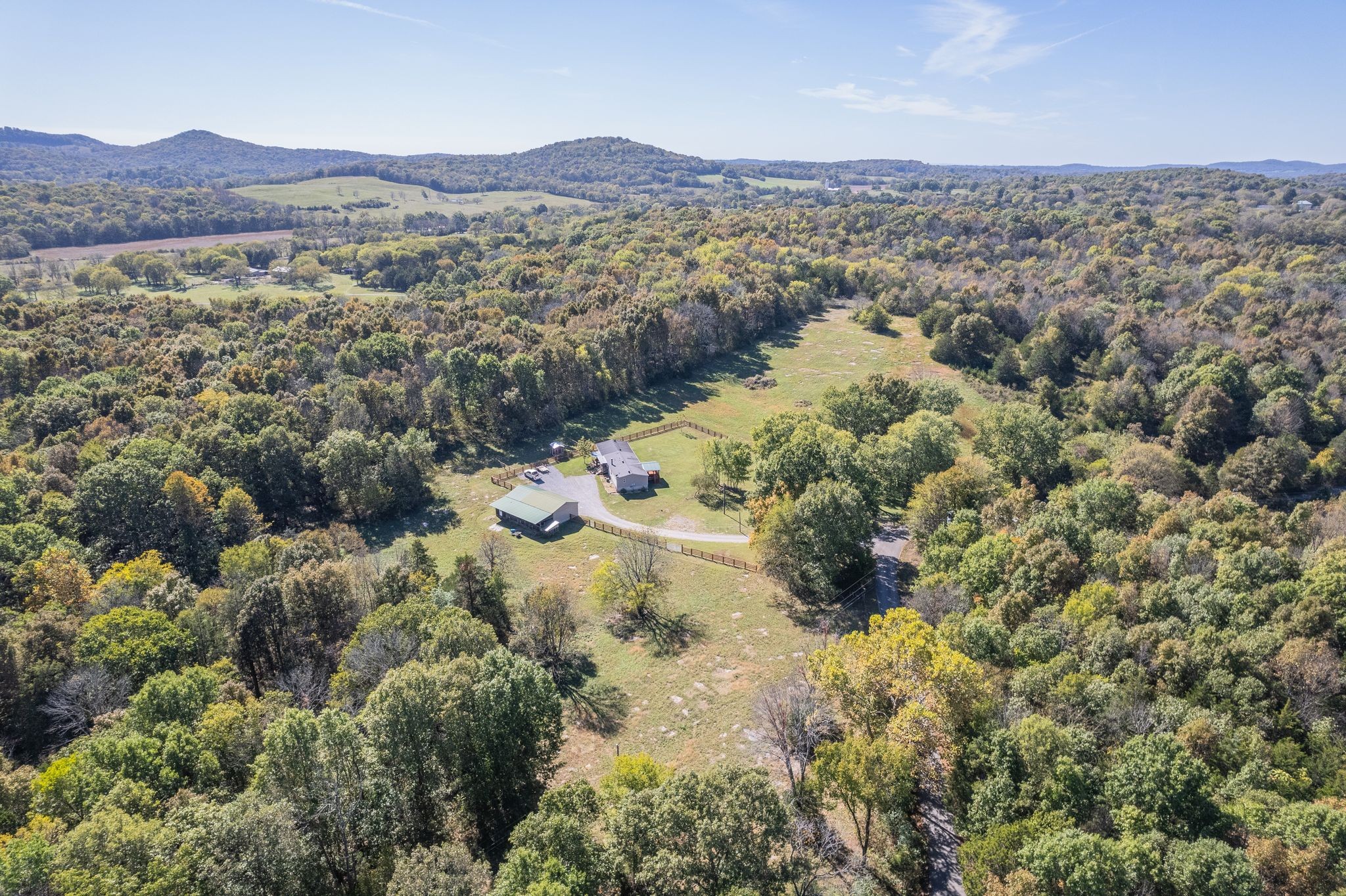 254 Borum Road Watertown, TN 37184 - Photo 47 of 51 a view of a lush green field with mountains in the background