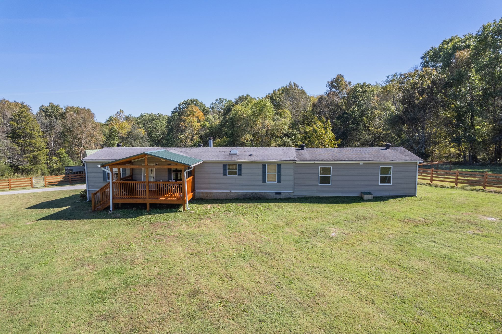 254 Borum Road Watertown, TN 37184 - Photo 5 of 51 a view of a house with yard and a trees