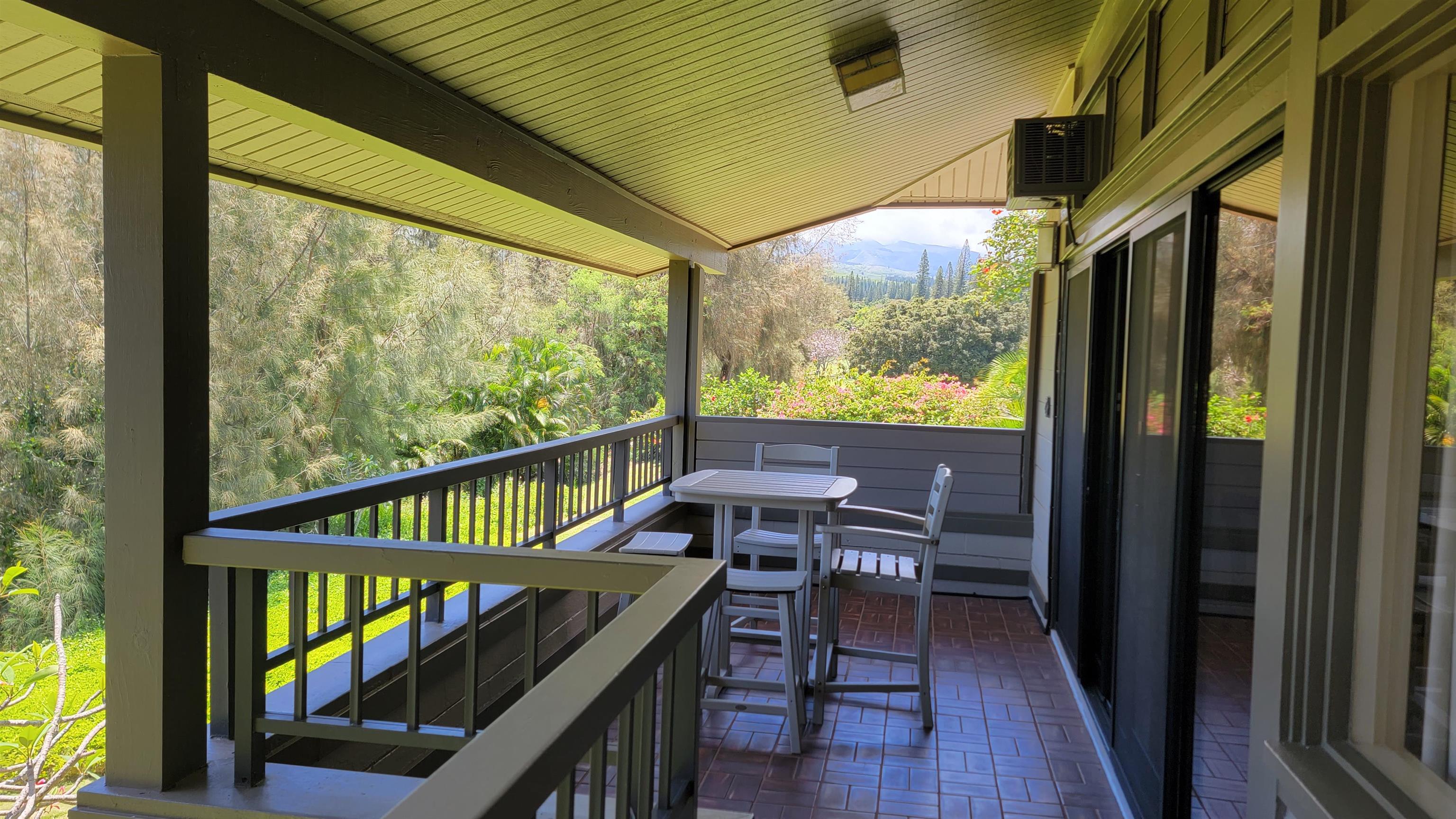 100 Ridge Road, Unit 724 Lahaina, HI 96761 - Photo 17 of 27 a view of balcony with furniture and wooden deck