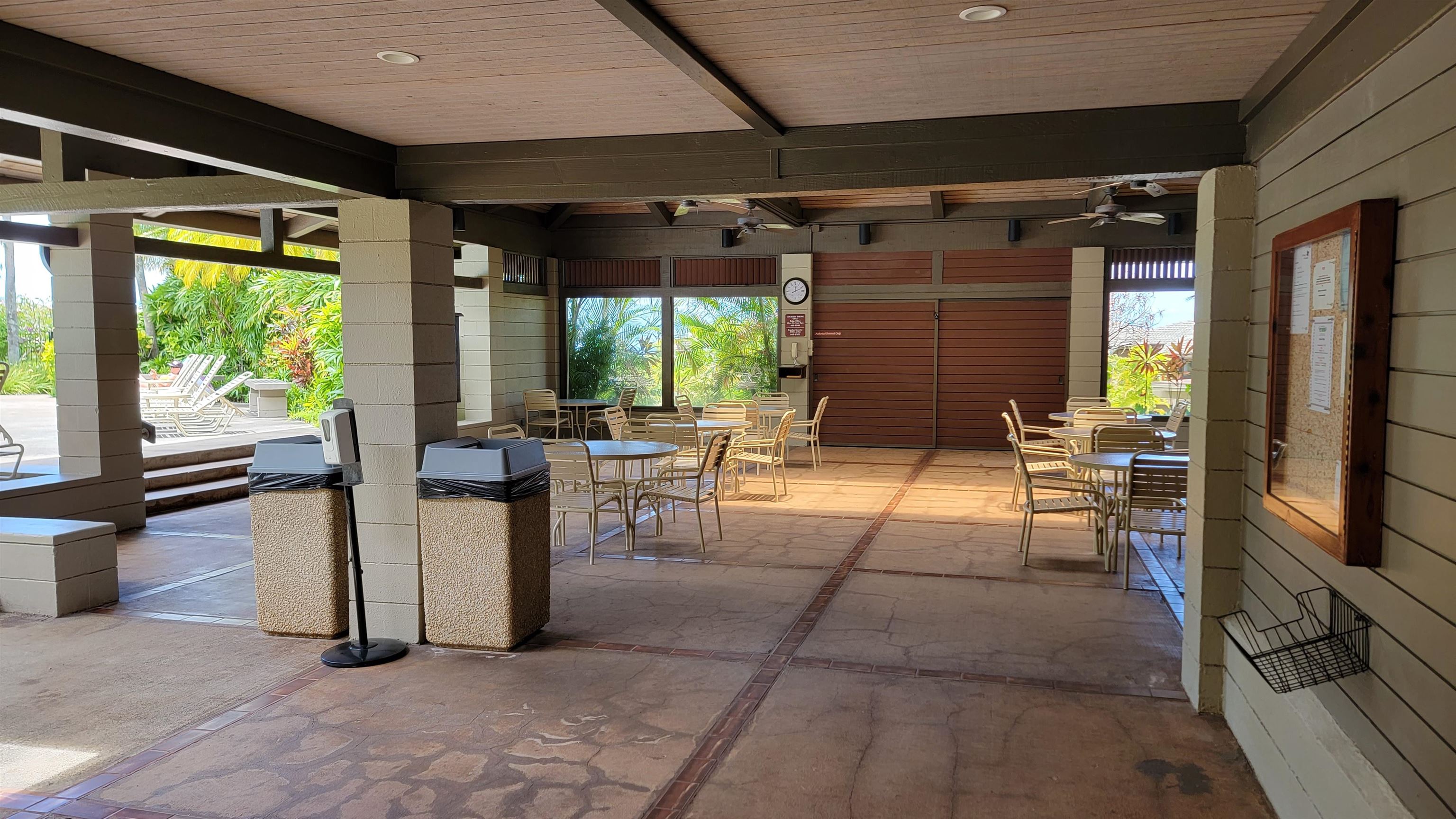 100 Ridge Road, Unit 724 Lahaina, HI 96761 - Photo 23 of 27 a building outdoor space with patio furniture and potted plants