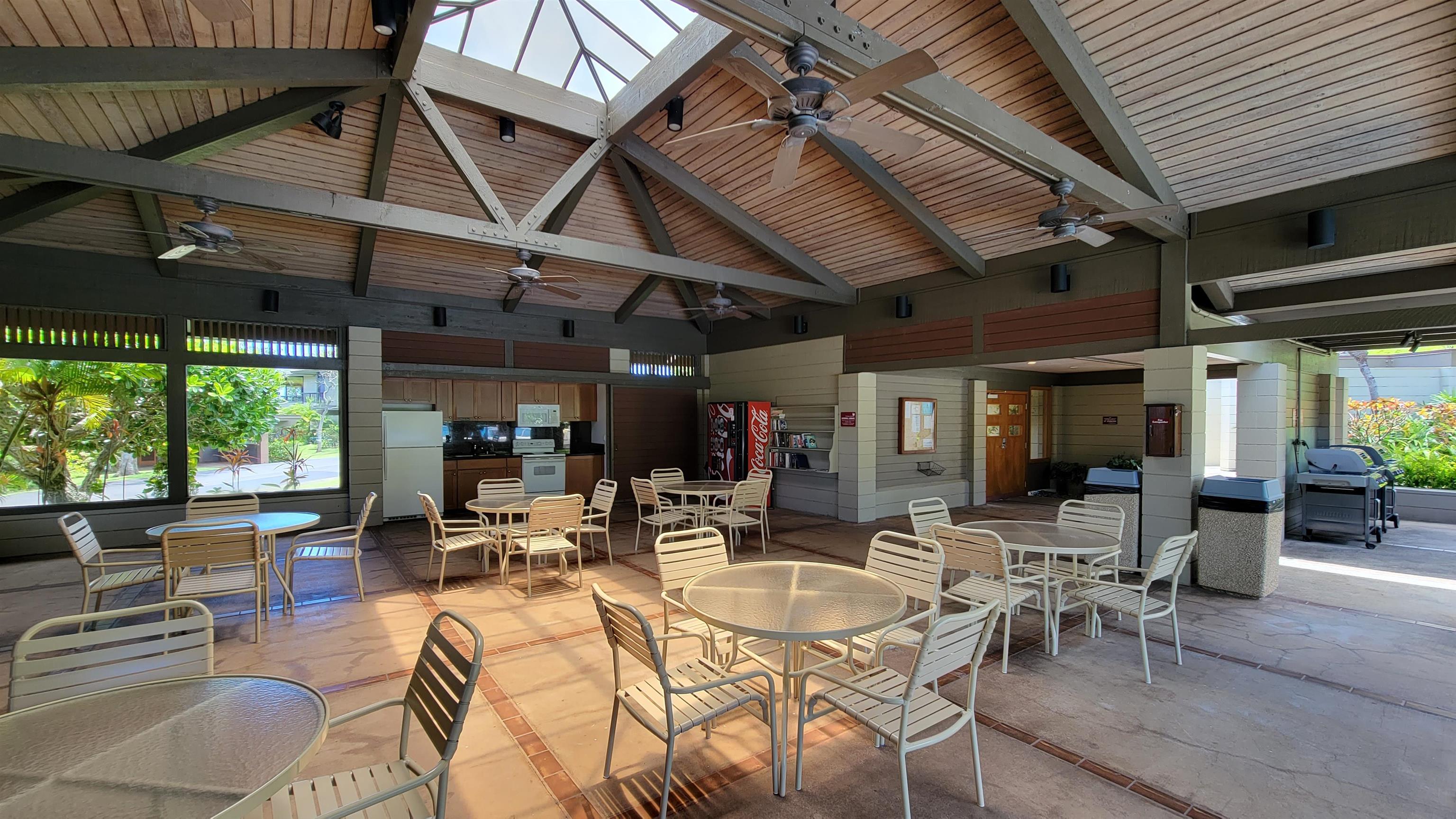 100 Ridge Road, Unit 724 Lahaina, HI 96761 - Photo 25 of 27 a view of a dinning table and chairs in the patio