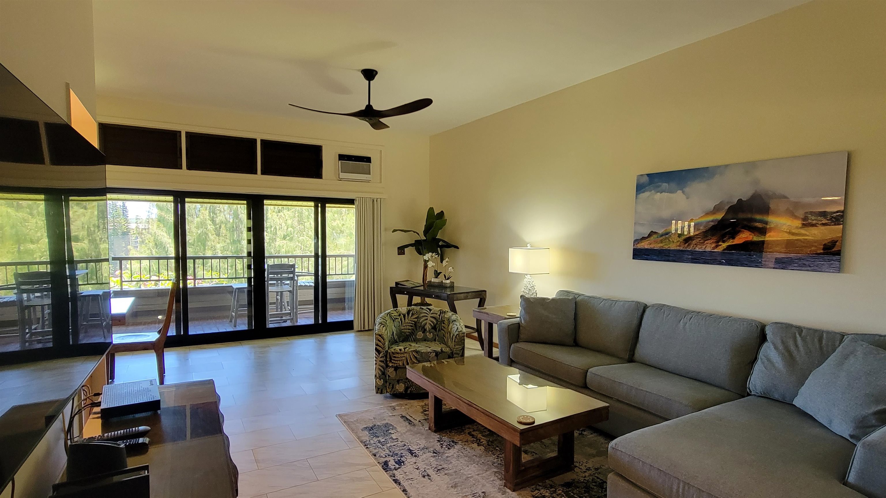 100 Ridge Road, Unit 724 Lahaina, HI 96761 - Photo 3 of 27 a living room with furniture and a large window
