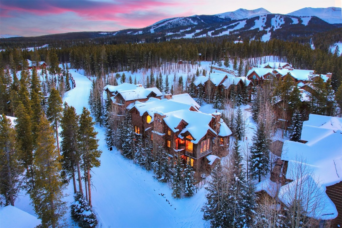72 Snowy Ridge Road Breckenridge, CO 80424 - Photo 1 of 40 a view of a lake with a mountain in the background