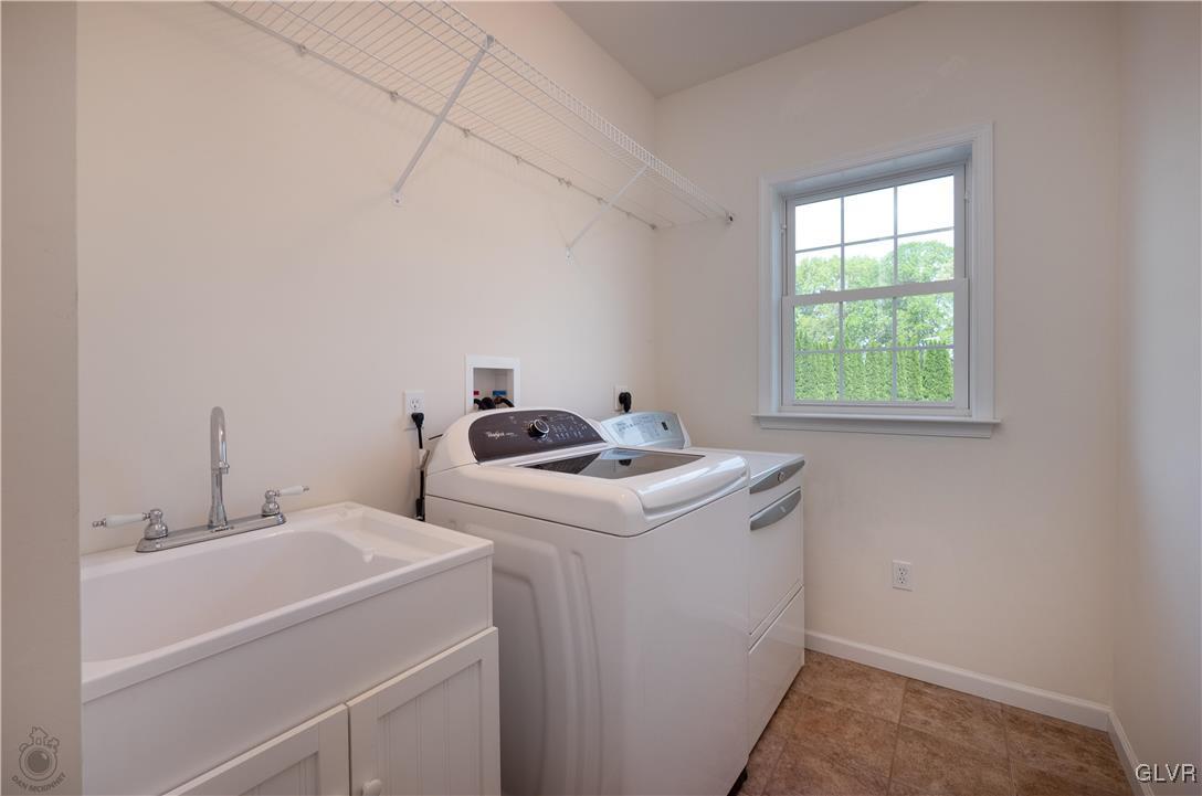 212 Bushkill Ridge Road Wind Gap, PA 18091 - Photo 18 of 36 a utility room with dryer and washer