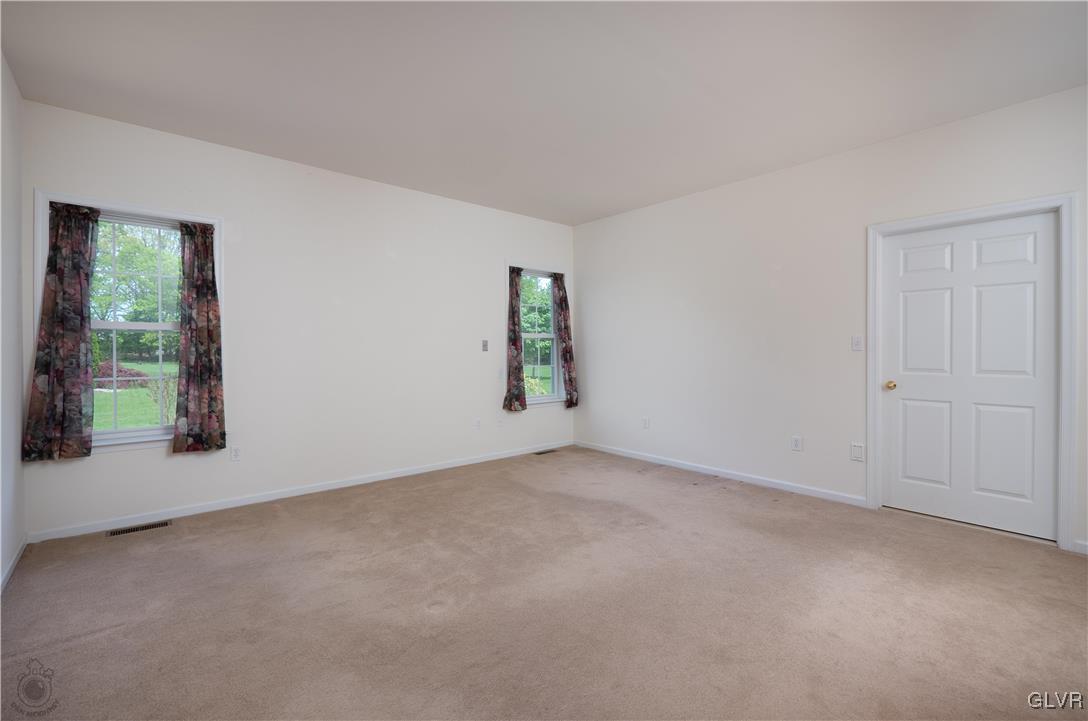 212 Bushkill Ridge Road Wind Gap, PA 18091 - Photo 20 of 36 an empty room with windows