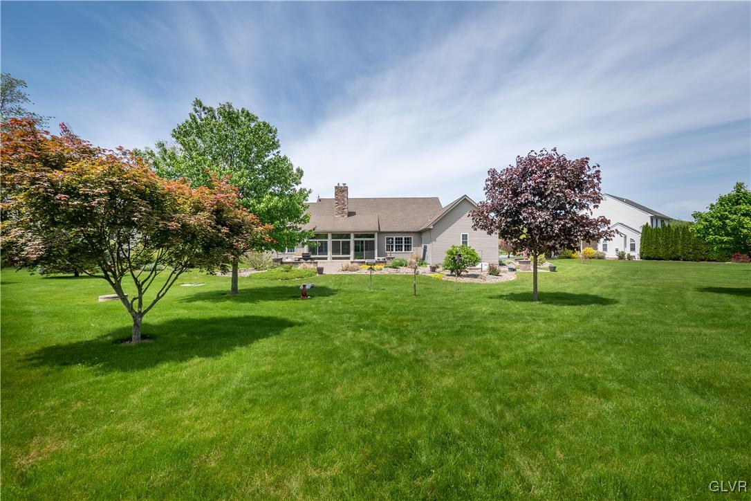 212 Bushkill Ridge Road Wind Gap, PA 18091 - Photo 30 of 36 a view of house with garden space and trees