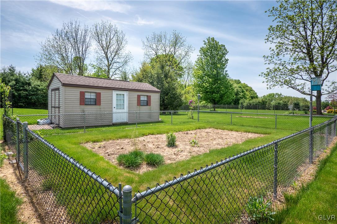 212 Bushkill Ridge Road Wind Gap, PA 18091 - Photo 32 of 36 a view of a backyard with table and chairs