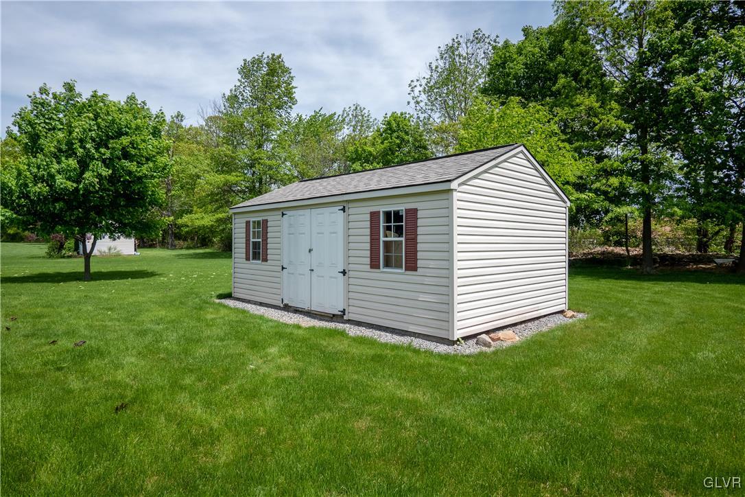 212 Bushkill Ridge Road Wind Gap, PA 18091 - Photo 33 of 36 a view of a house with a yard
