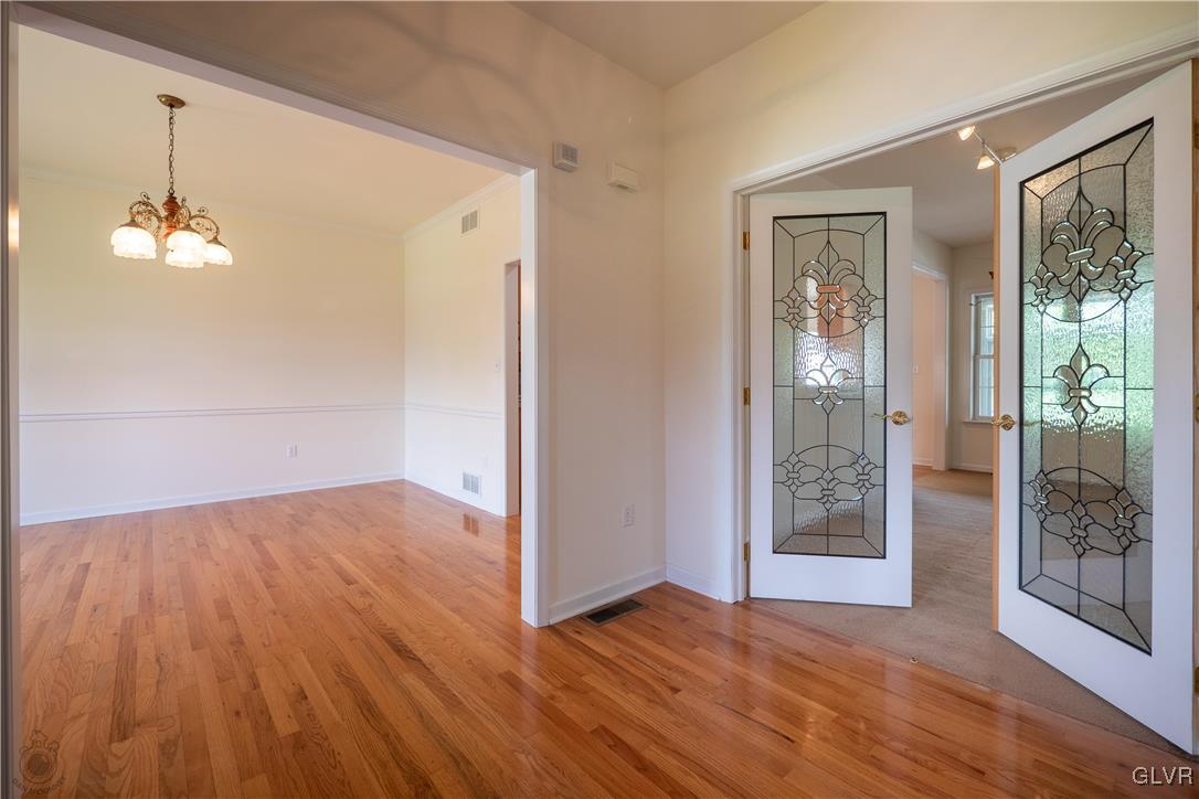 212 Bushkill Ridge Road Wind Gap, PA 18091 - Photo 8 of 36 a view of a room with wooden floor and front door
