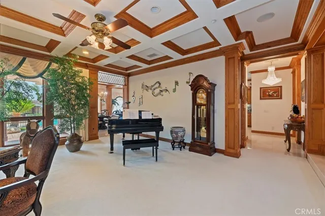 a living room with furniture windows and a fireplace
