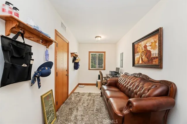 a bathroom with a double vanity sink toilet mirror and shower