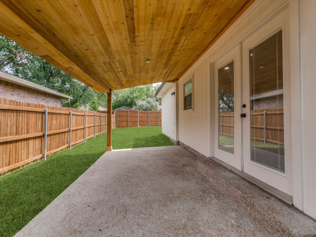 2032 Meadfoot Road Carrollton, TX 75007 - Photo 14 of 17 Custom patio slab with cedar pergola