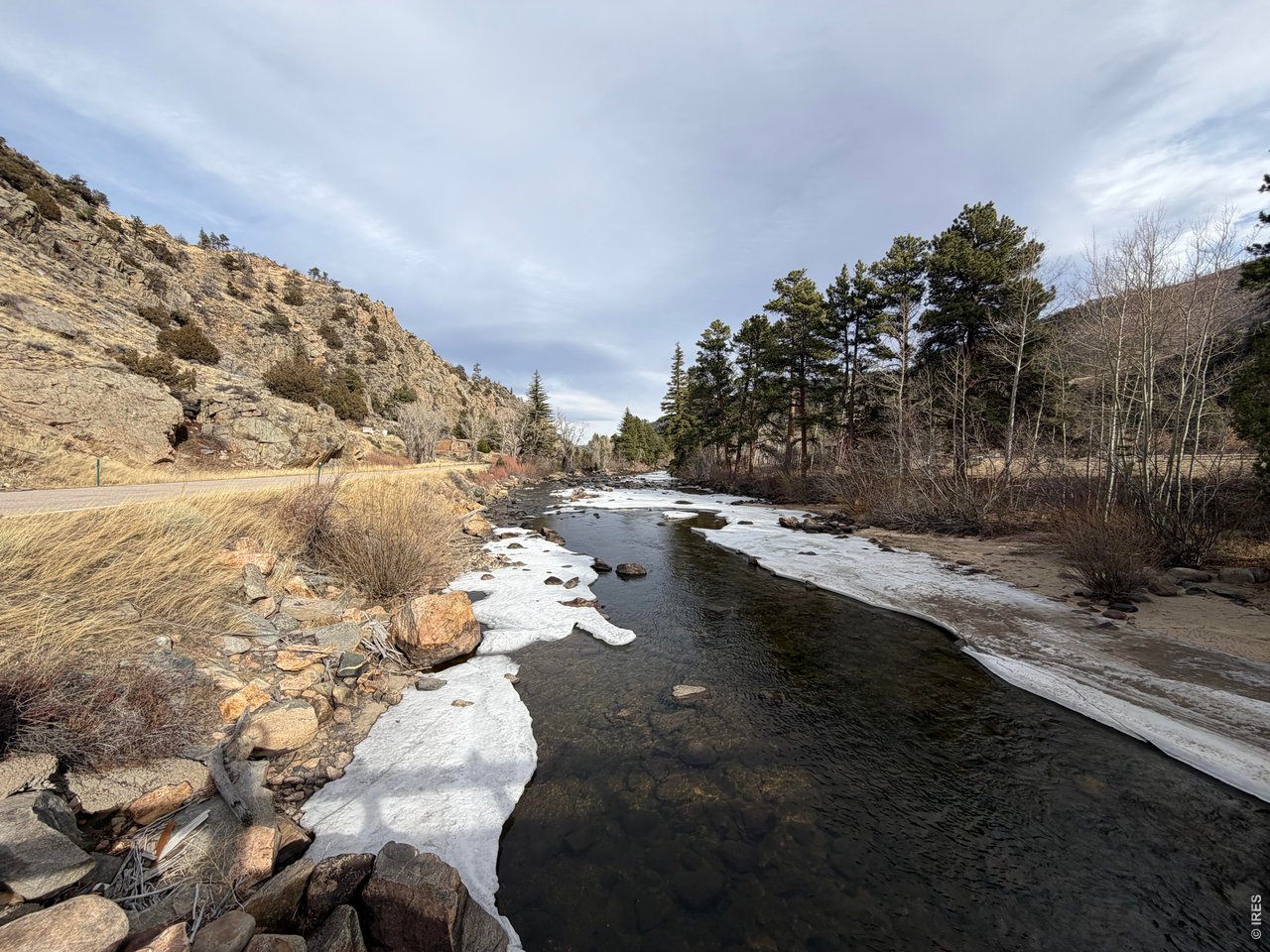 32370 Poudre Canyon Road Bellvue, CO 80512 - Photo 2 of 30 a view of a pathway with a yard