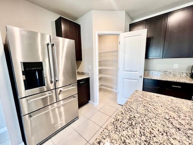 1251 McNeal Road Spring Hill, FL 34608 - Photo 12 of 46 a kitchen with stainless steel appliances granite countertop a refrigerator and a sink