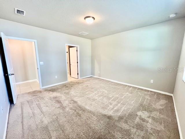 1251 McNeal Road Spring Hill, FL 34608 - Photo 20 of 46 a view of an empty room and a bathroom