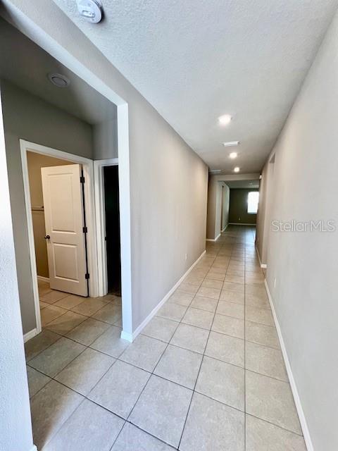 1251 McNeal Road Spring Hill, FL 34608 - Photo 29 of 46 a view of a hallway