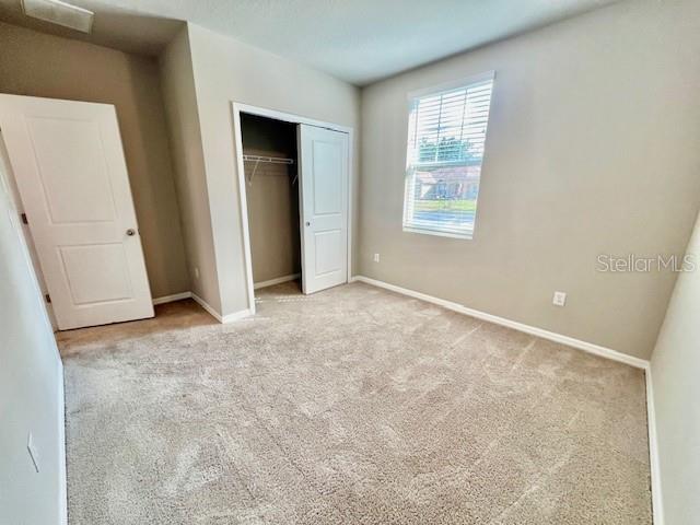 1251 McNeal Road Spring Hill, FL 34608 - Photo 31 of 46 an empty room with windows