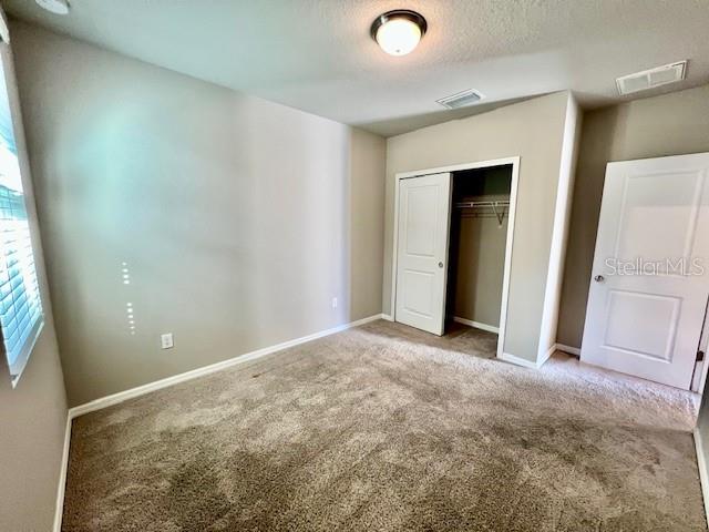 1251 McNeal Road Spring Hill, FL 34608 - Photo 33 of 46 an empty room with windows