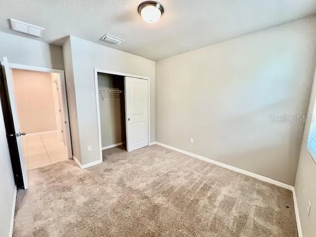 an empty room with closet