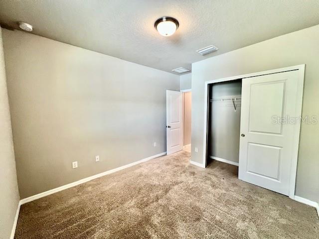 1251 McNeal Road Spring Hill, FL 34608 - Photo 35 of 46 an empty room with closet area