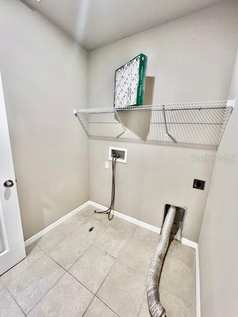 1251 McNeal Road Spring Hill, FL 34608 - Photo 40 of 46 a view of entryway with a white wall and a potted plant