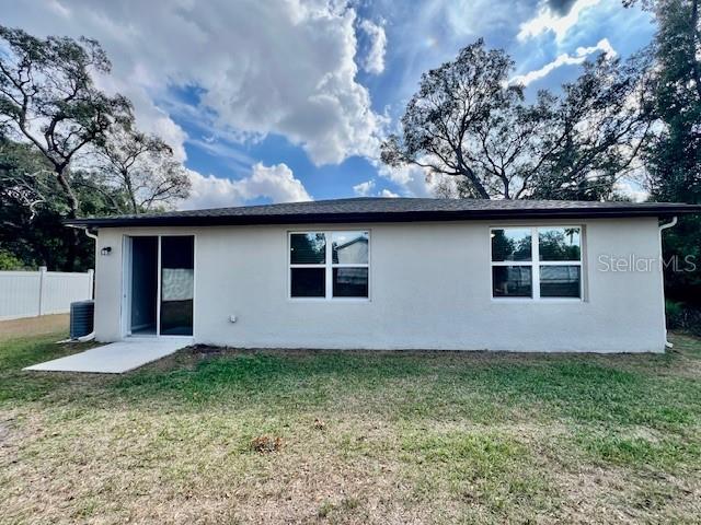 1251 McNeal Road Spring Hill, FL 34608 - Photo 46 of 46 a front view of house with yard