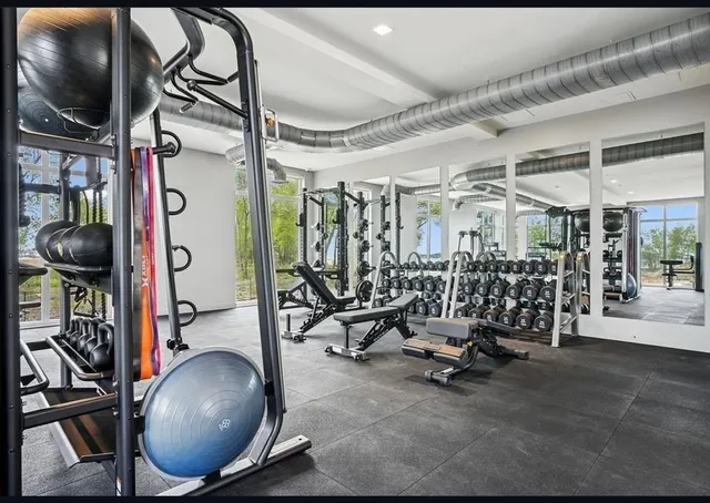 a view of a room with gym equipment