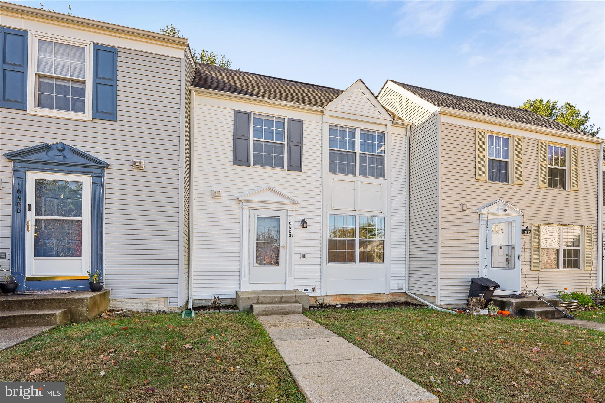 10602 Chisholm Landing Terrace Gaithersburg, MD 20878 - Photo 1 of 46 a front view of a house with a yard