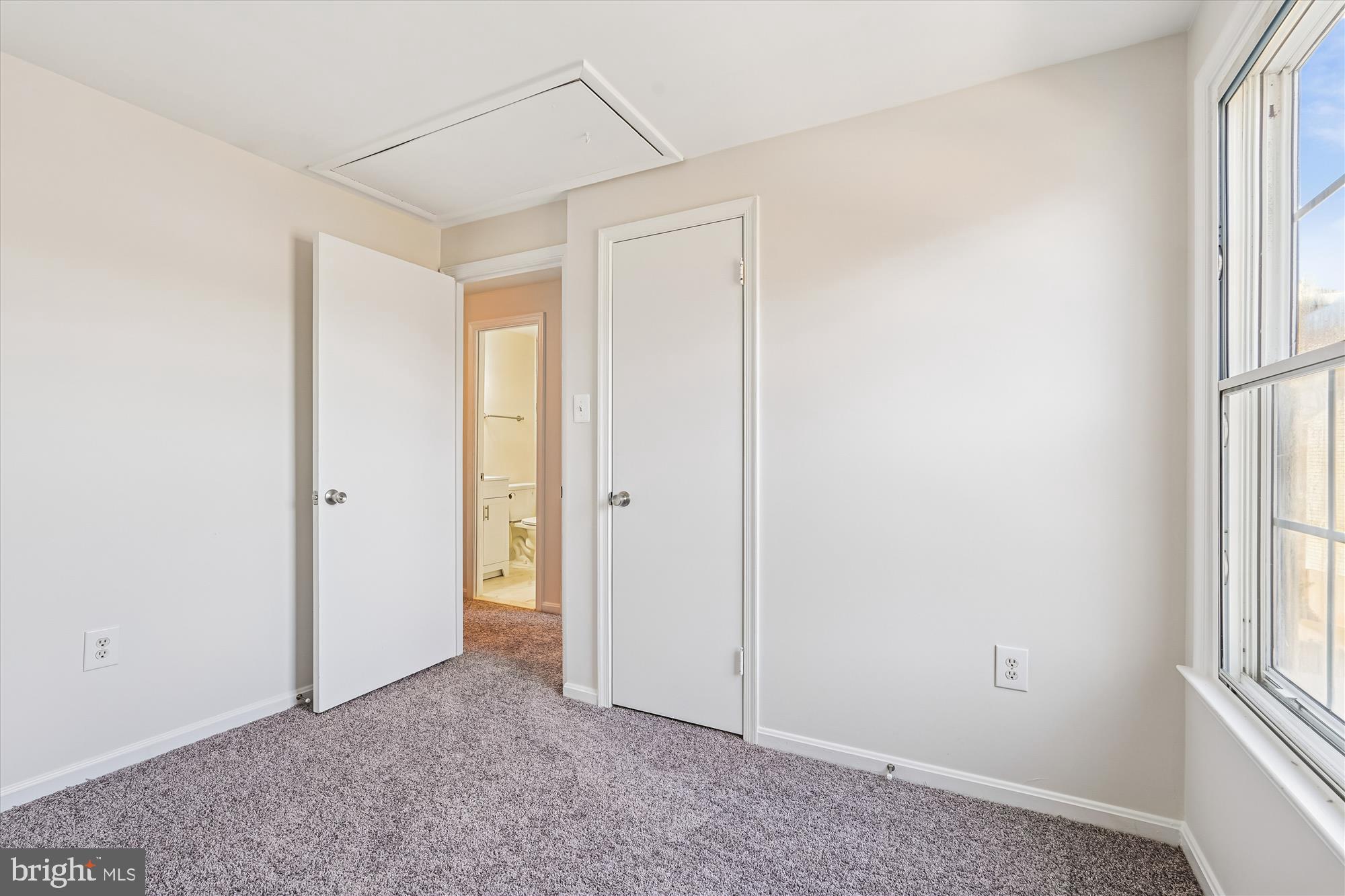 10602 Chisholm Landing Terrace Gaithersburg, MD 20878 - Photo 11 of 46 a view of an empty room with a window