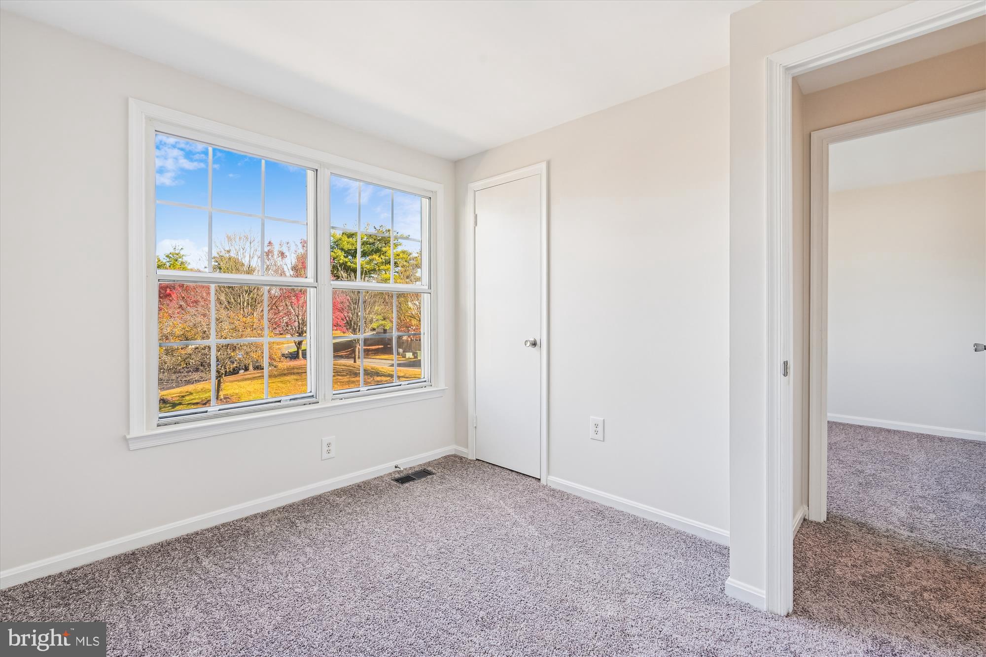 10602 Chisholm Landing Terrace Gaithersburg, MD 20878 - Photo 13 of 46 a view of an empty room with a window