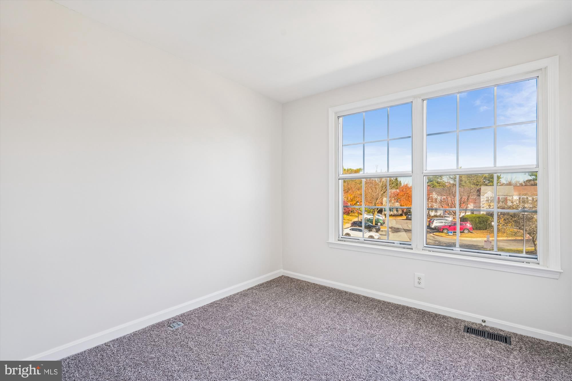 10602 Chisholm Landing Terrace Gaithersburg, MD 20878 - Photo 14 of 46 a view of an empty room with a window