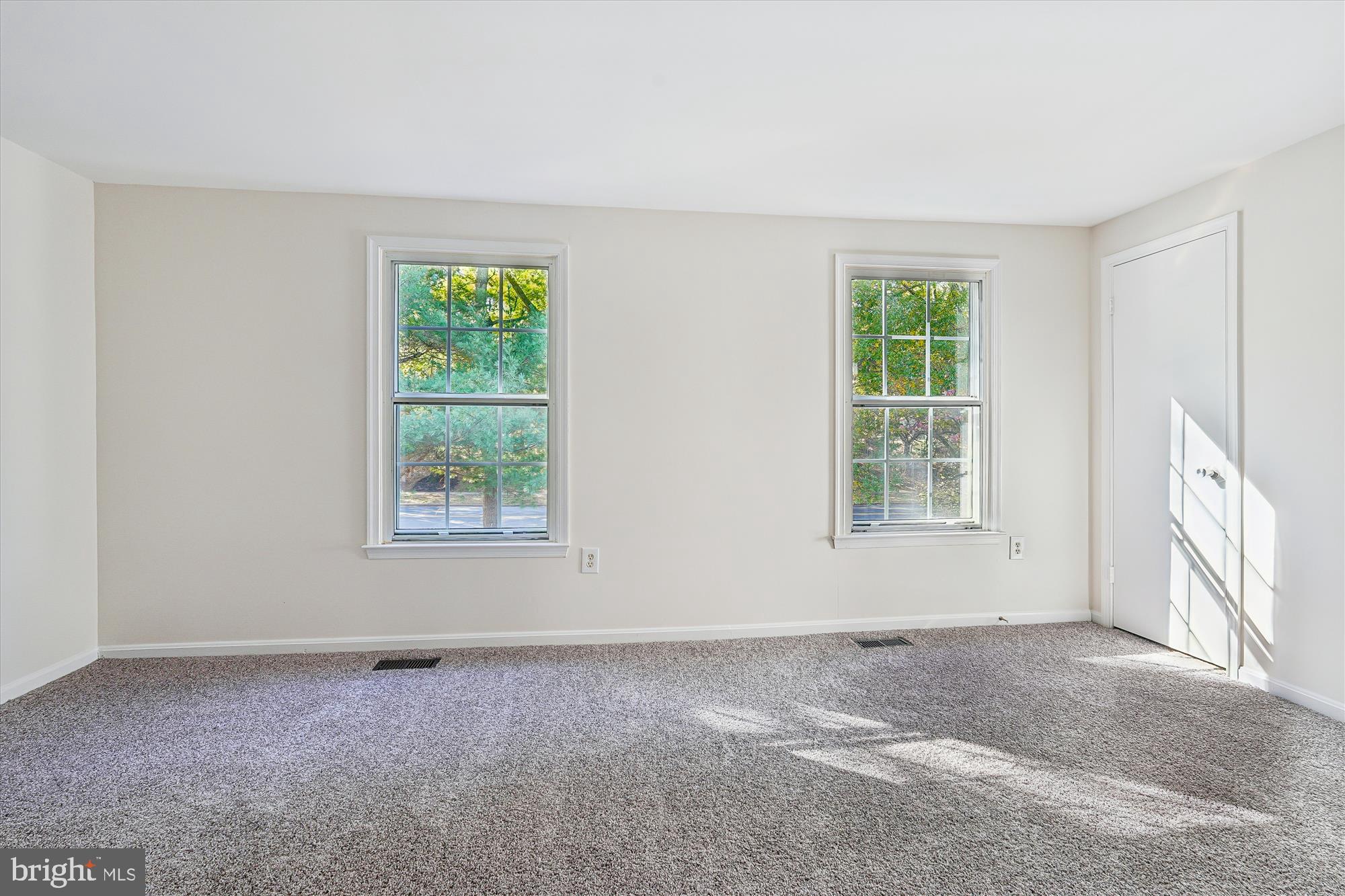 10602 Chisholm Landing Terrace Gaithersburg, MD 20878 - Photo 18 of 46 an empty room with windows