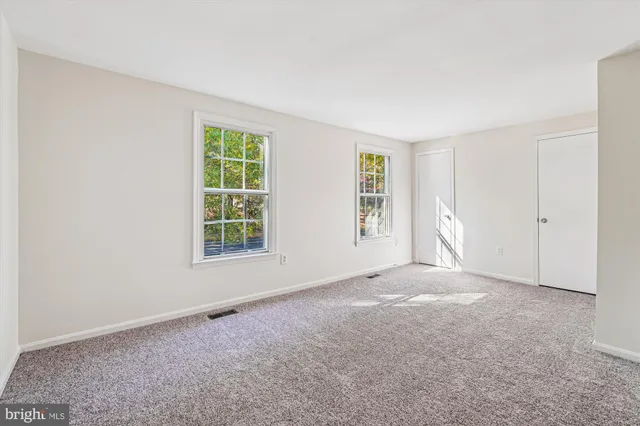 a view of livingroom with hardwood floor and window
