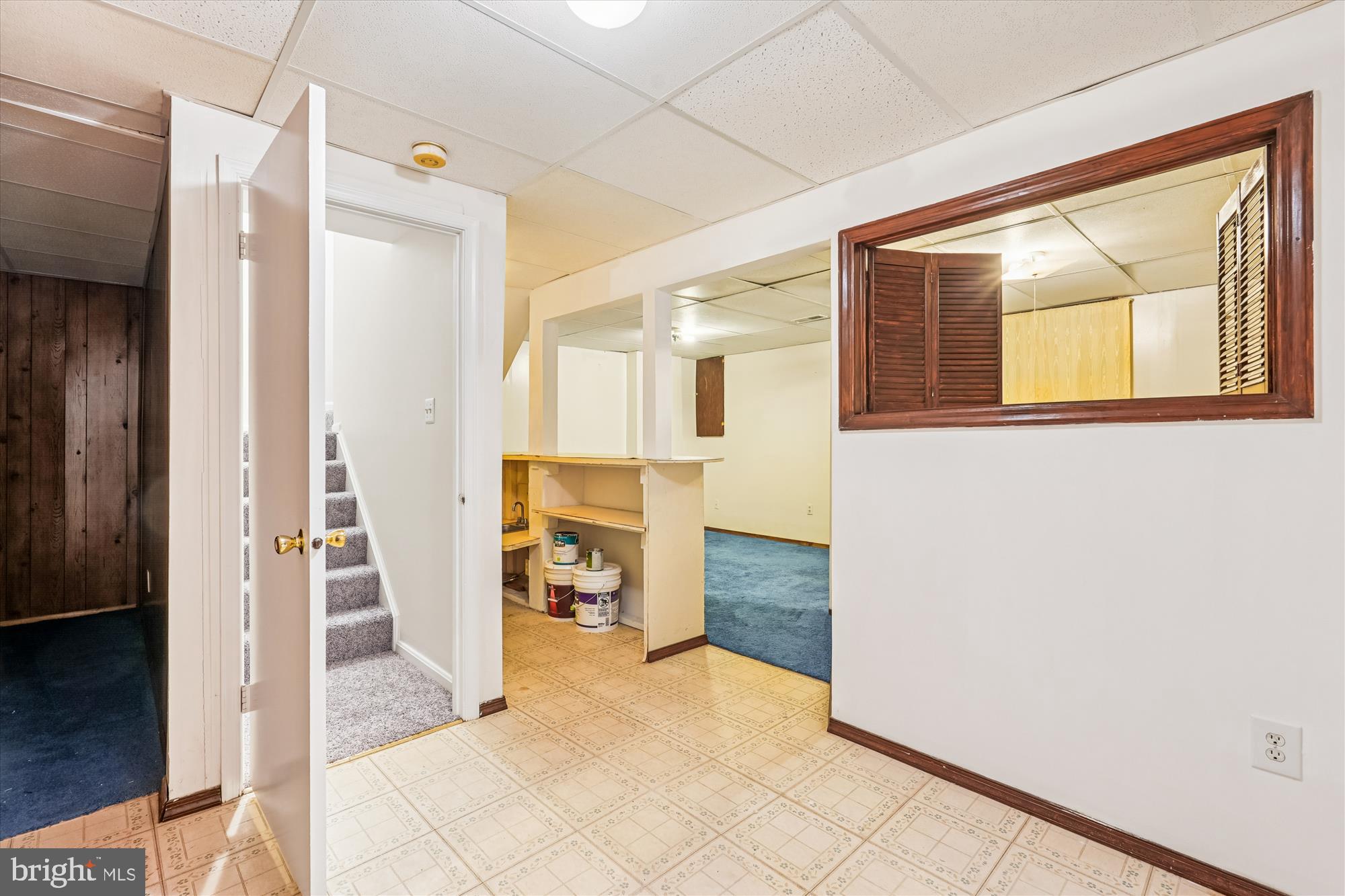 10602 Chisholm Landing Terrace Gaithersburg, MD 20878 - Photo 27 of 46 a view of a hallway with wooden floor and a living room