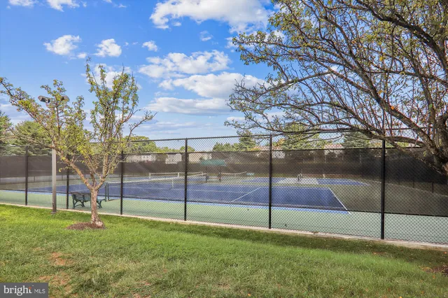 a view of a lake with a yard
