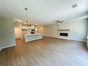 2326 Portrush Way Southeast Atlanta, GA 30339 - Photo 11 of 11 a view of a kitchen with a sink and a fireplace