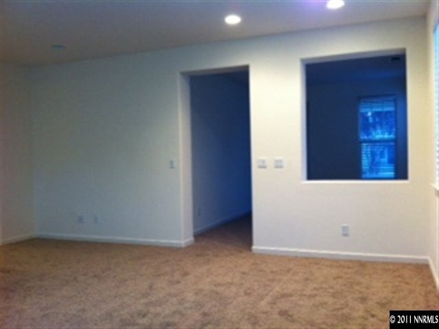 876 North University Park Loop Reno, NV 89512 - Photo 3 of 9 an empty room with windows