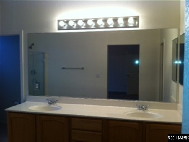 876 North University Park Loop Reno, NV 89512 - Photo 5 of 9 a bathroom with a sink and a mirror