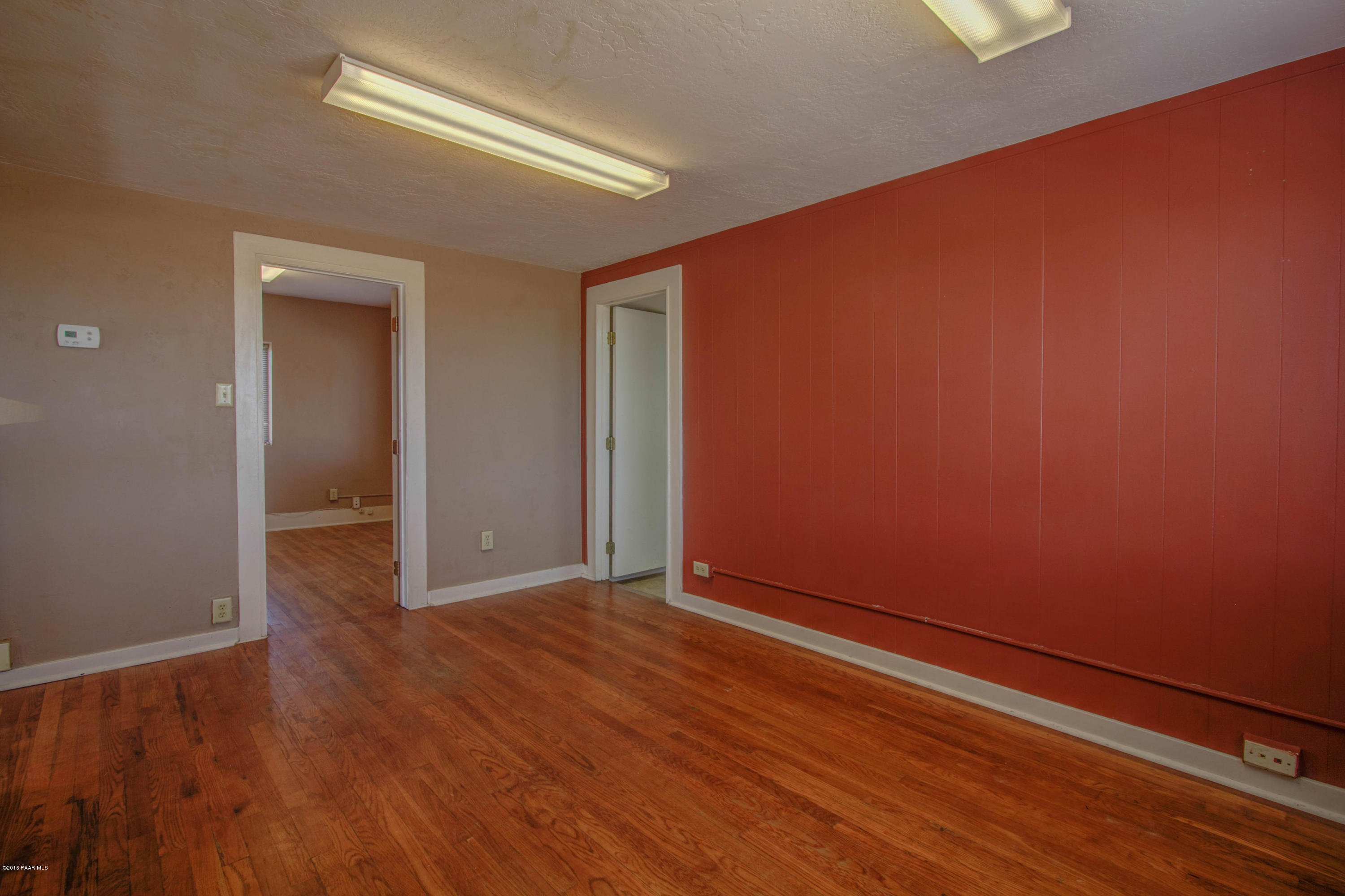 575 West Iris Road Paulden, AZ 86334 - Photo 15 of 18 an empty room with wooden floor