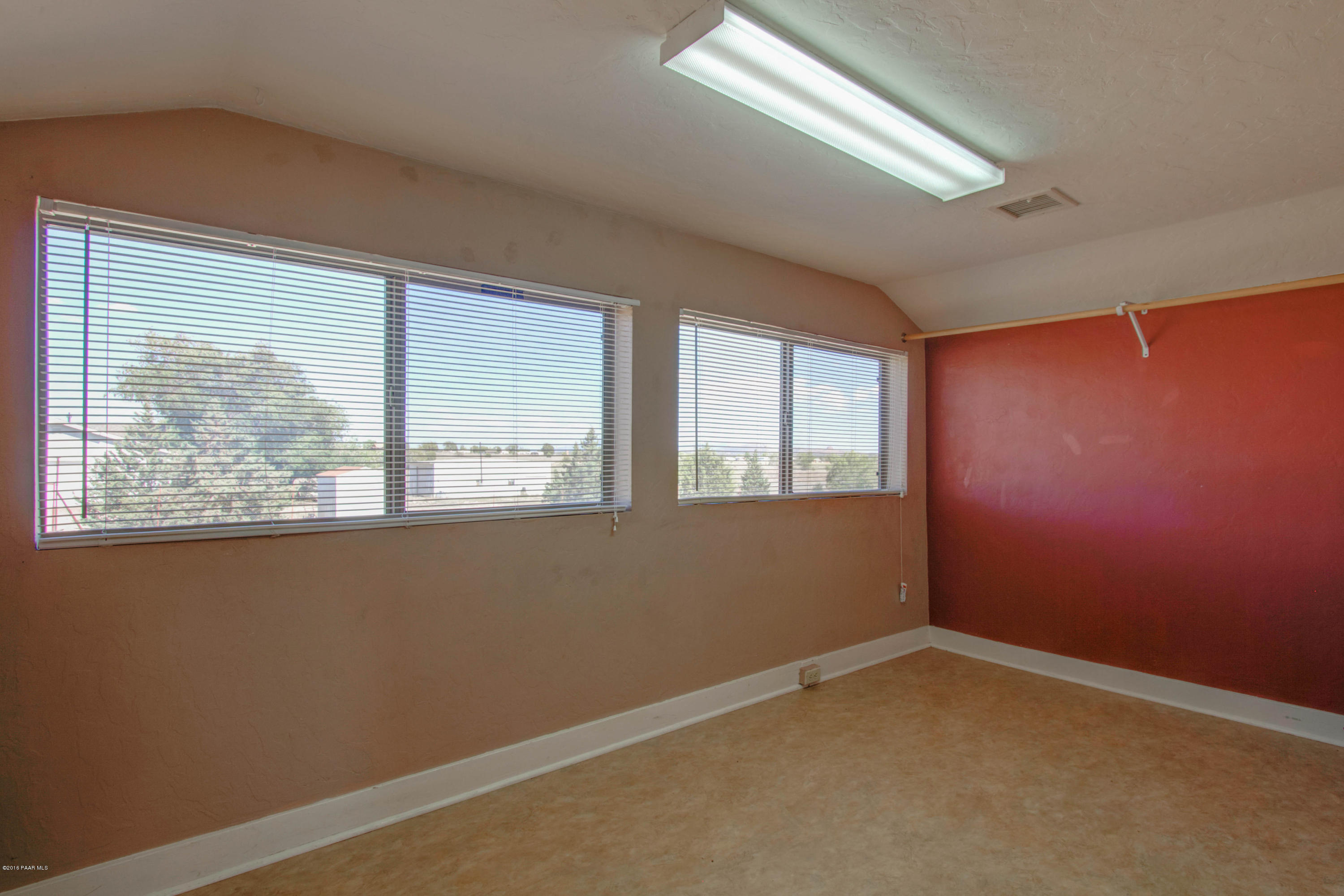 575 West Iris Road Paulden, AZ 86334 - Photo 3 of 18 an empty room with a window
