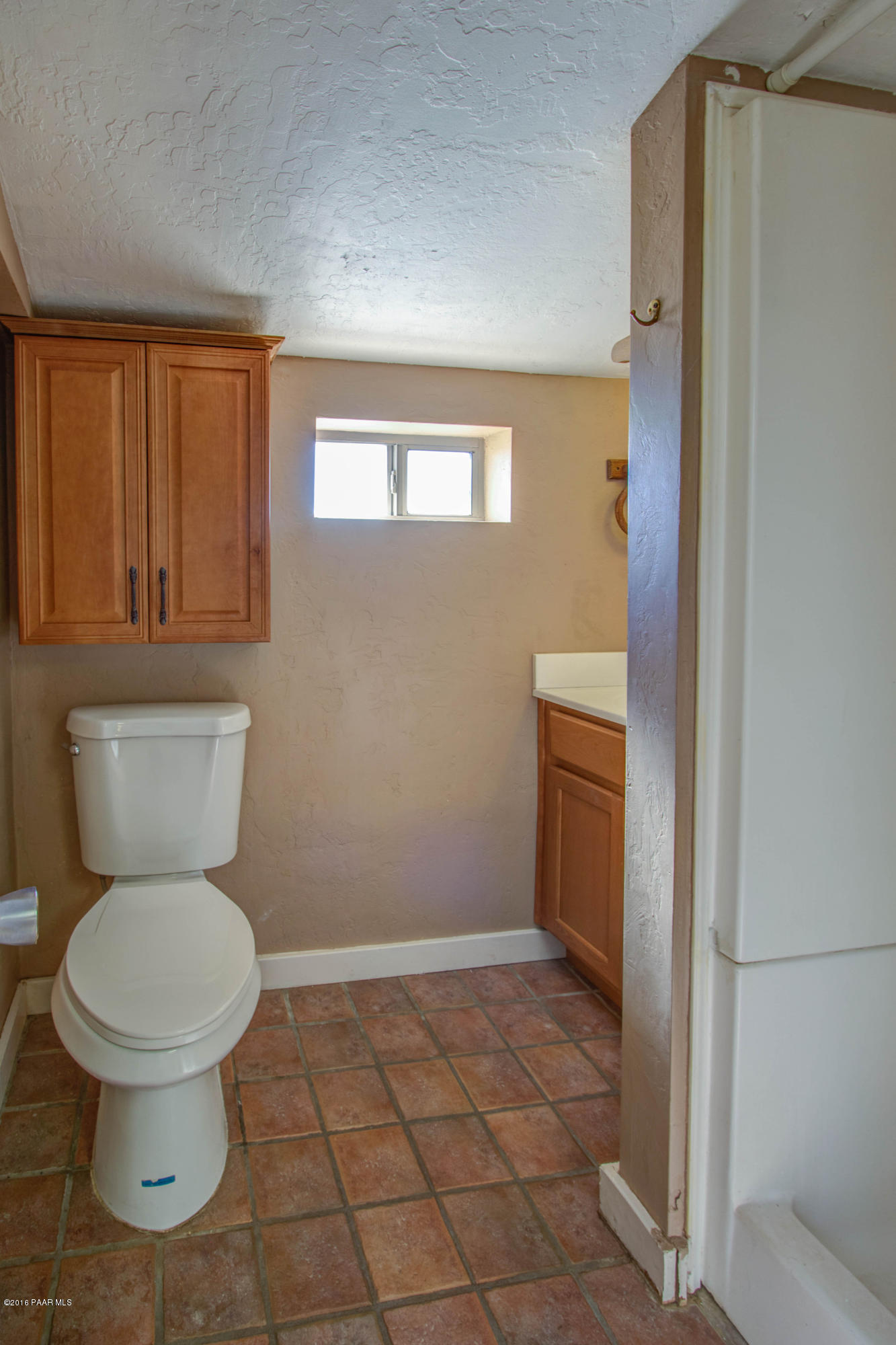575 West Iris Road Paulden, AZ 86334 - Photo 6 of 18 a bathroom with a toilet and a shower