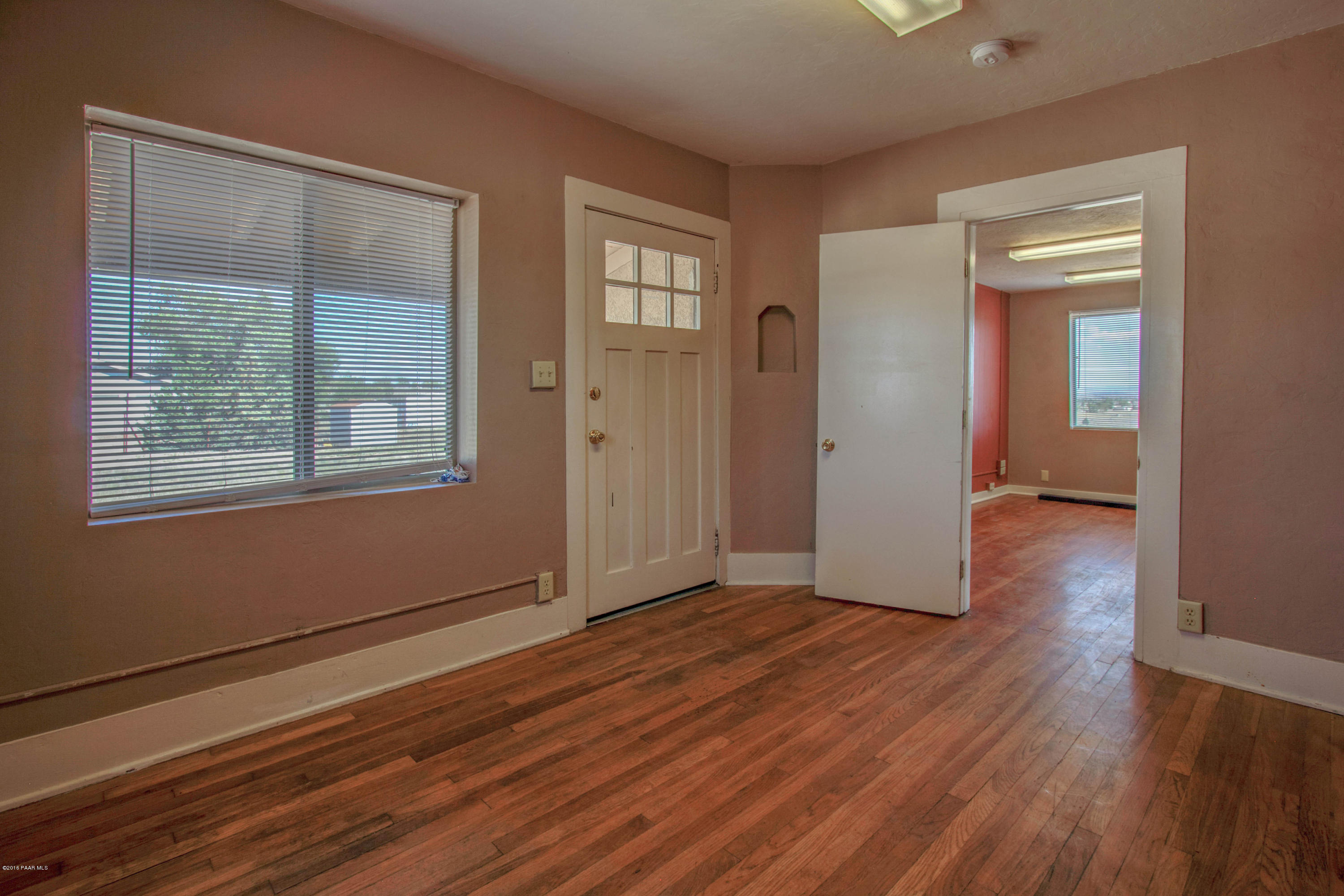 575 West Iris Road Paulden, AZ 86334 - Photo 8 of 18 a view of livingroom with hardwood floor and hallway