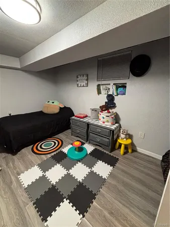 a room with furniture closet and wooden floor