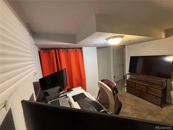 a view of a living room with furniture