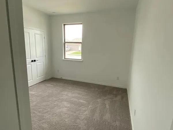 an empty room with a door