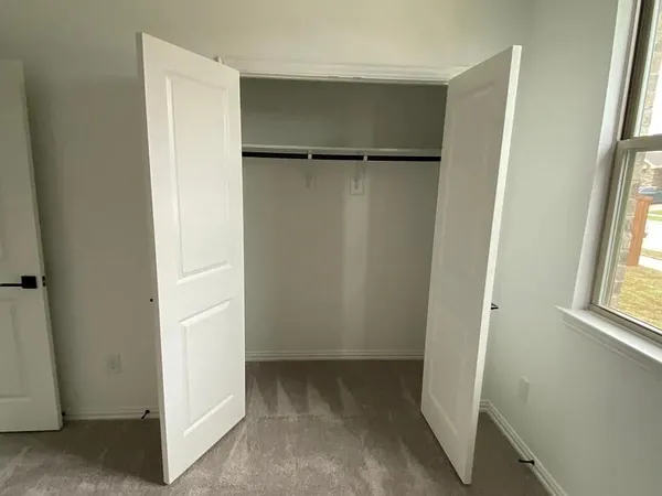 an empty room with a window