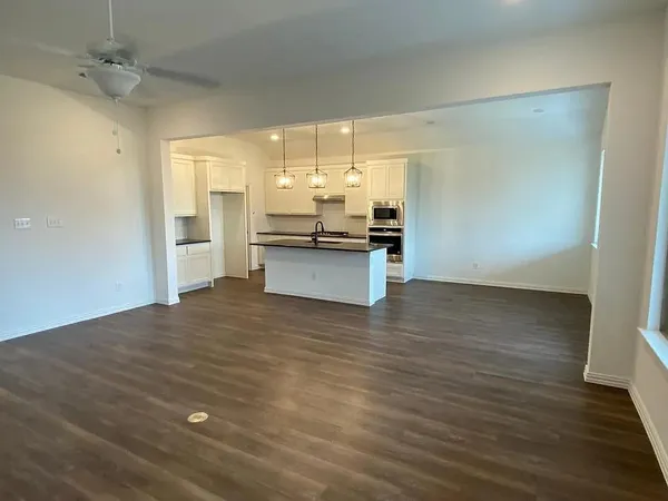 a view of a kitchen with a sink