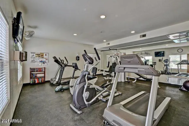 a view of a room with gym equipment