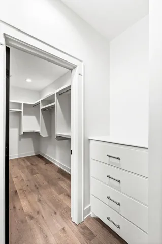 a view of an empty walk in closet